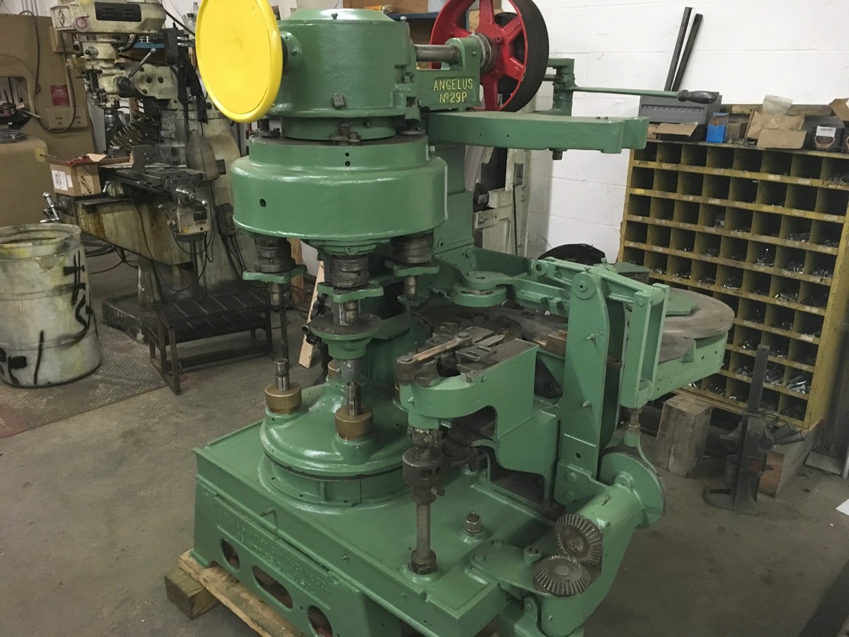 Picture of can seamer machine and parts from Melvina Can Machinery offering new and used can seamers and parts.