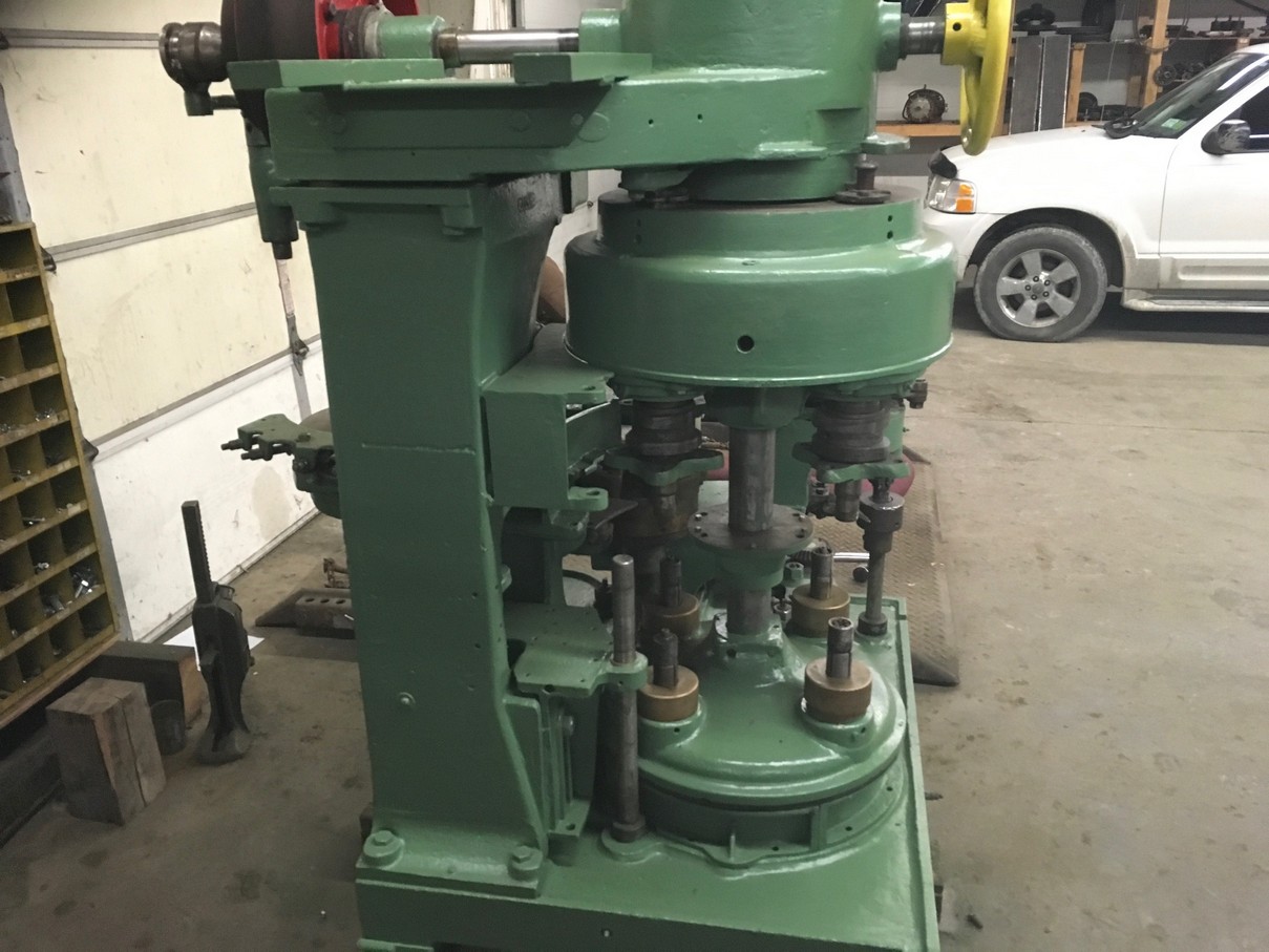 Picture of can seamer machine and parts from Melvina Can Machinery offering new and used can seamers and parts.