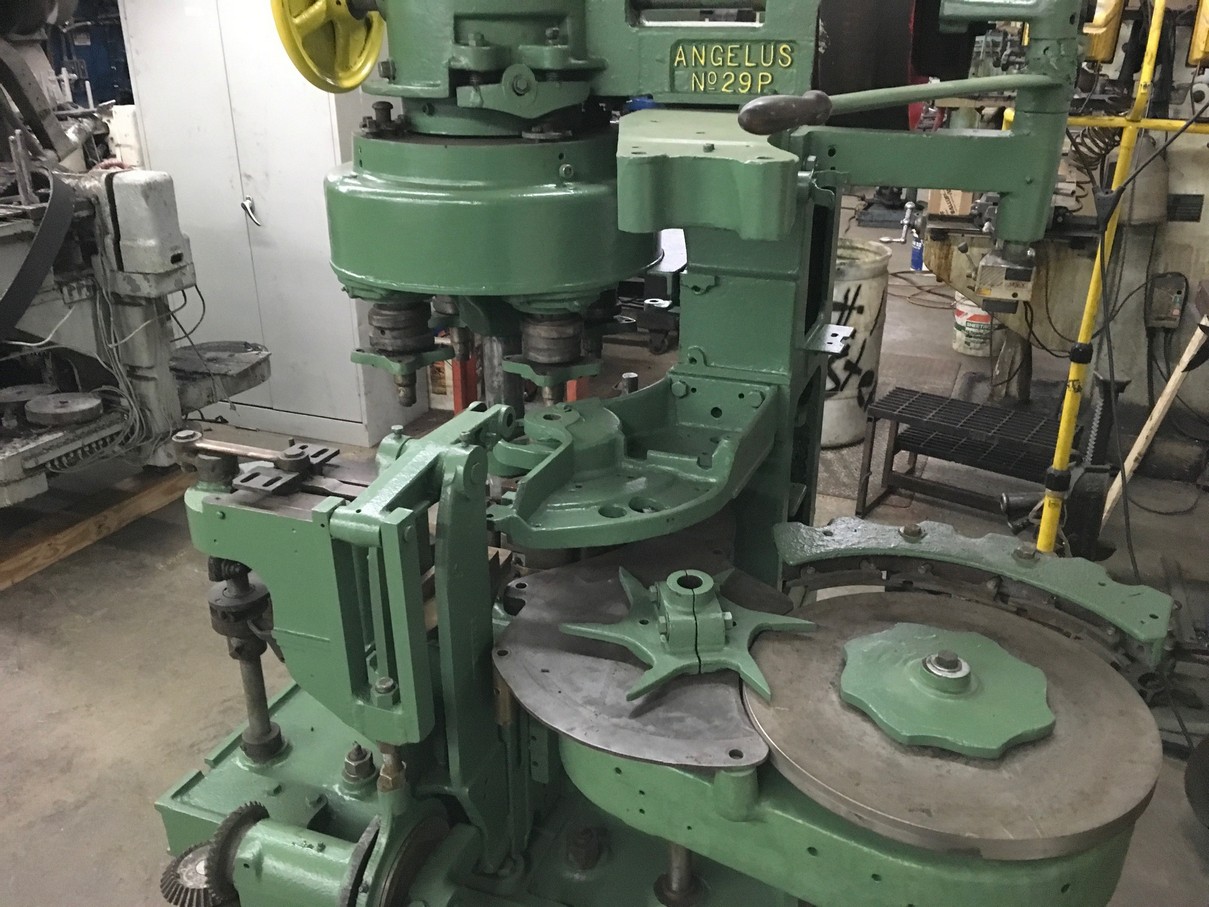 Picture of can seamer machine and parts from Melvina Can Machinery offering new and used can seamers and parts.