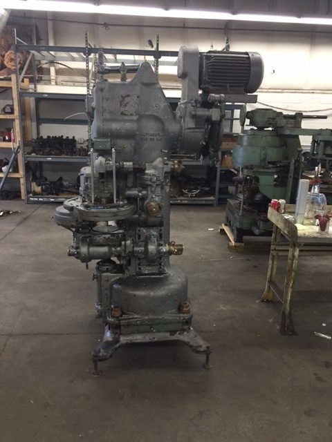 Picture of can seamer machine and parts from Melvina Can Machinery offering new and used can seamers and parts.